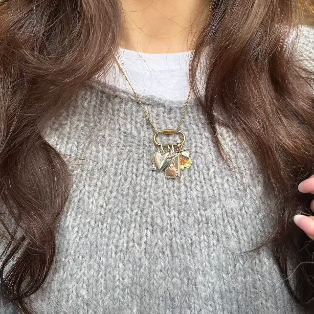 mix and match necklace worn with into you charm, ace charm, flower and heart of gold charm