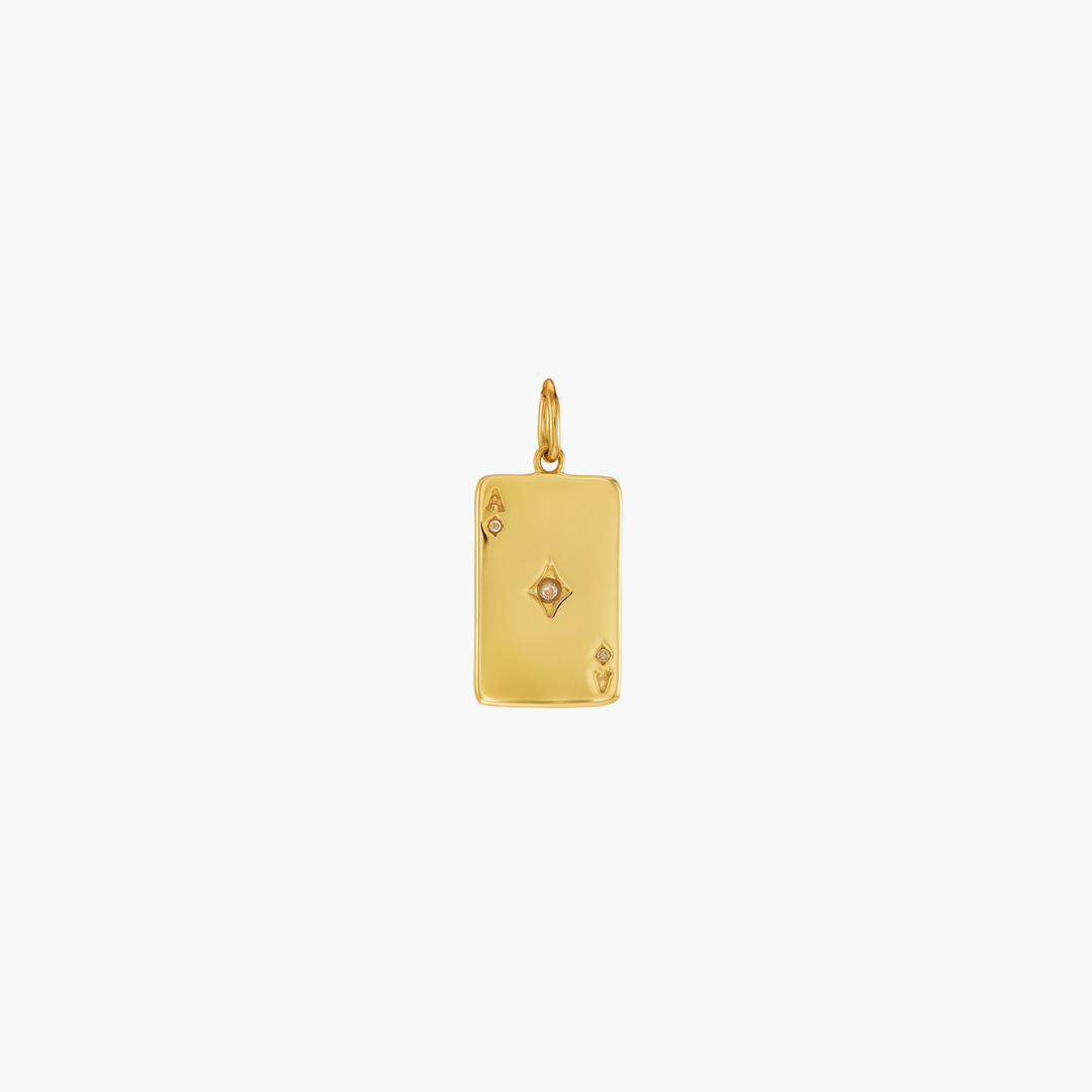 Ass-Charme in Gold mit Zirkonia-Steinen auf weißem Hintergrund Produktbild