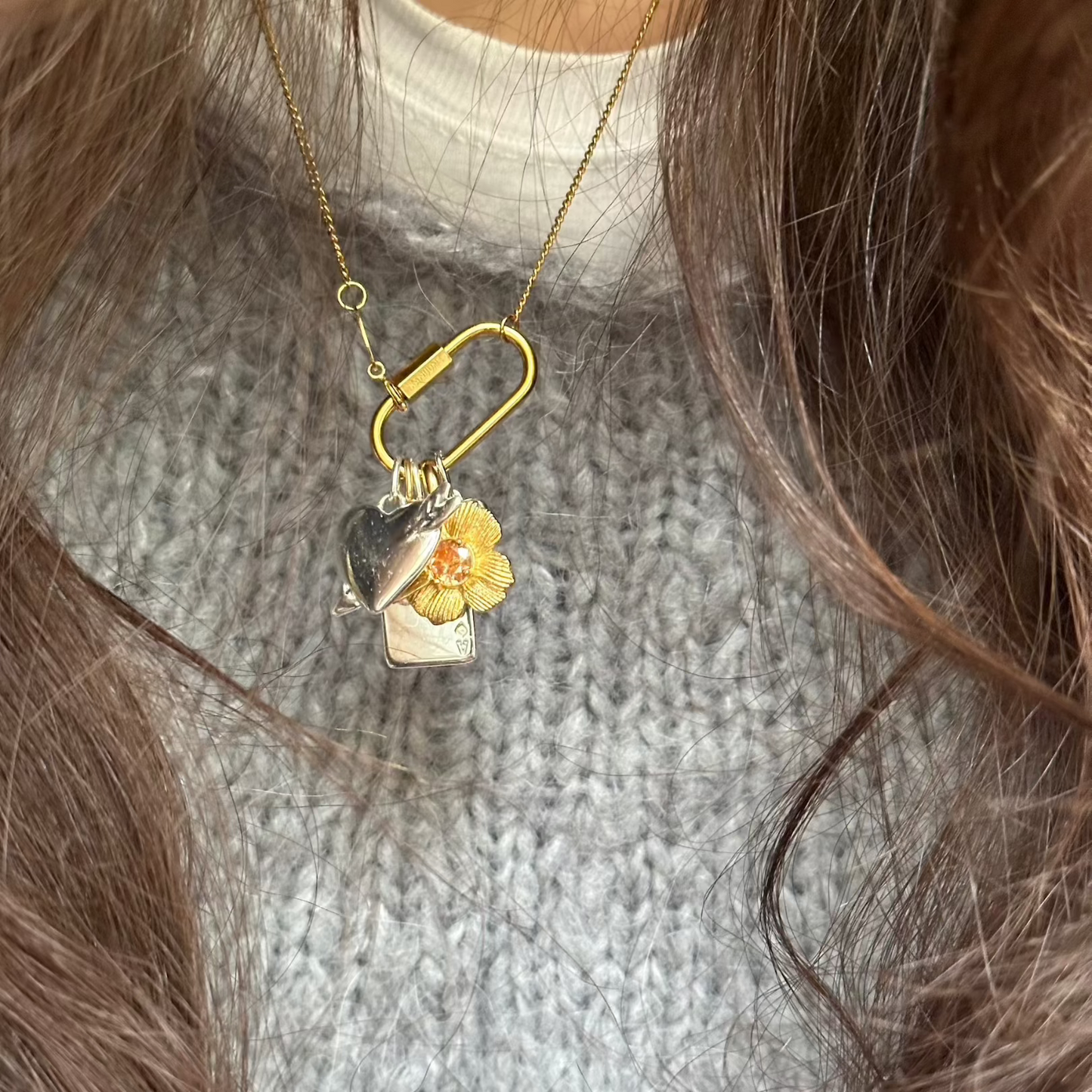 necklace worn with mix and match charms on women close up