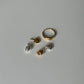 gig ring and heart of gold charm and strawberry charm on white background